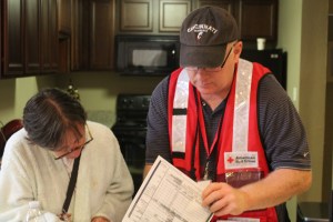 north-olmsted-ohio-resident-christine-kisela-assisted-by-red-cross-volunteer-gary-grano