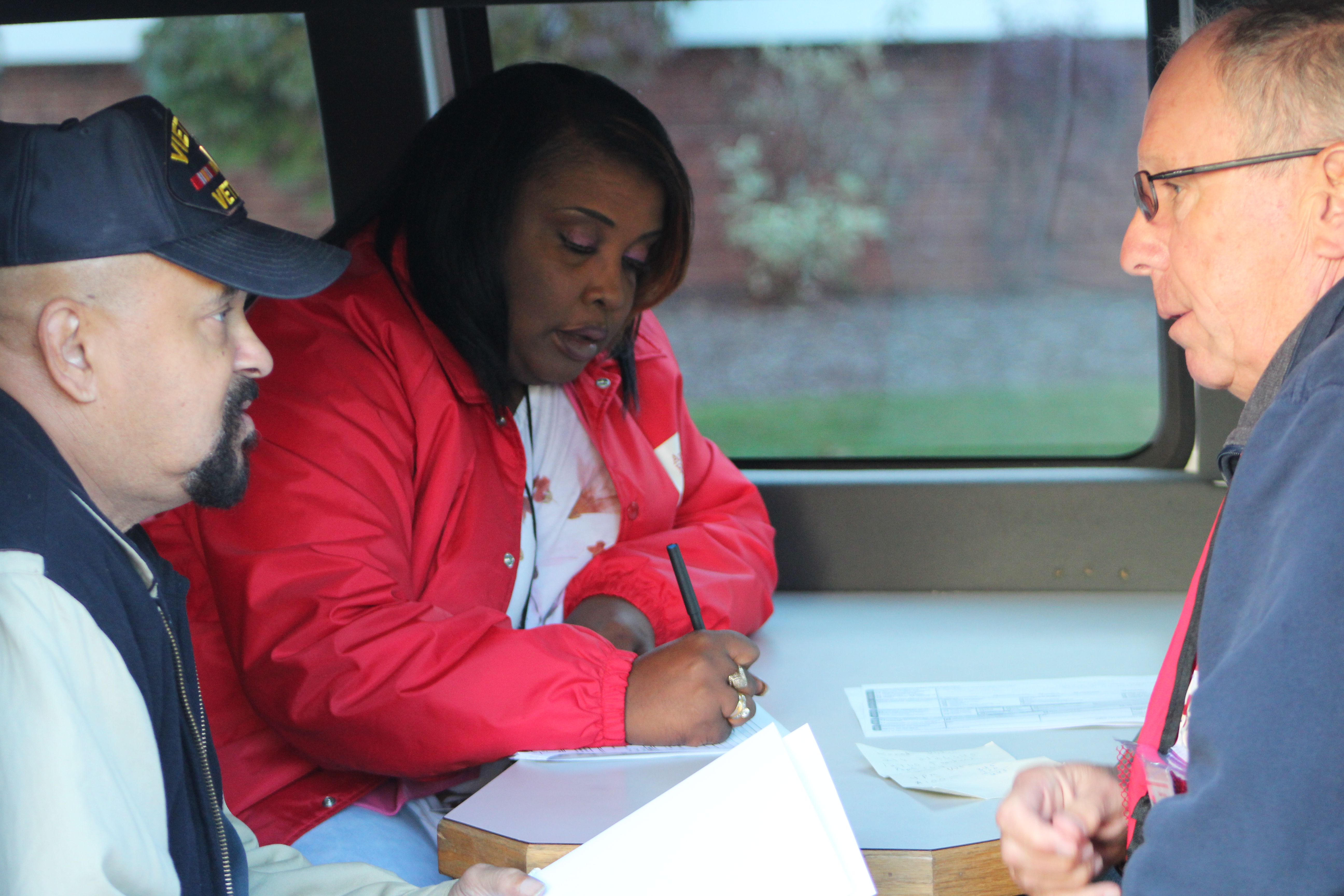 resident-keith-dulin-receives-help-from-red-cross-volunteers-bill-geschke-and-felicia-lee-3